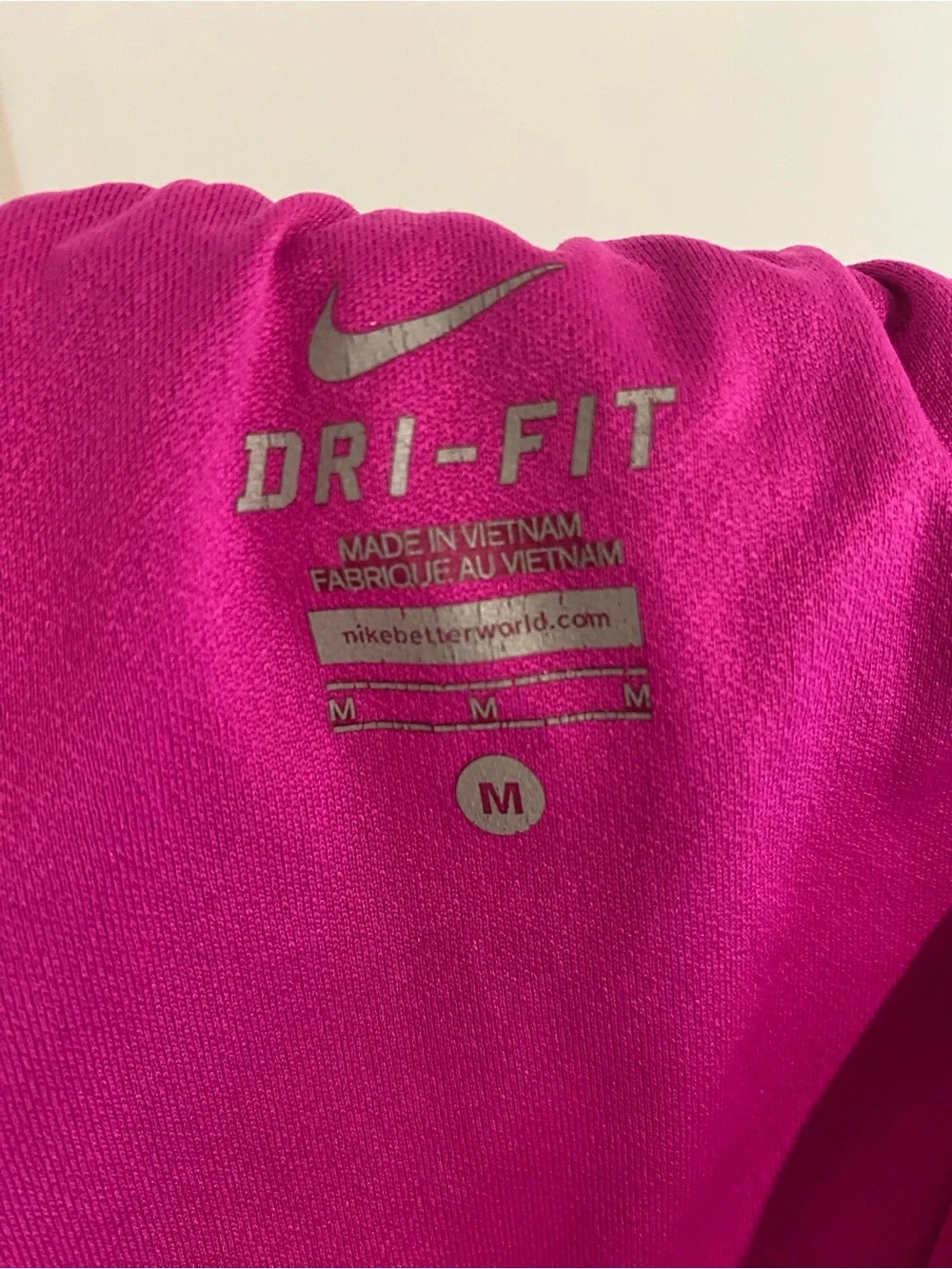Nike Women’s Black Athletic Shorts with Magenta Trim
